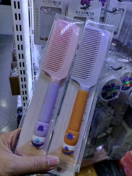 LƯỢC NHỰA CHẢI ĐẦU