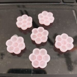 NÚT ĐỰNG KEO (Hoa Mai) 90-100pcs